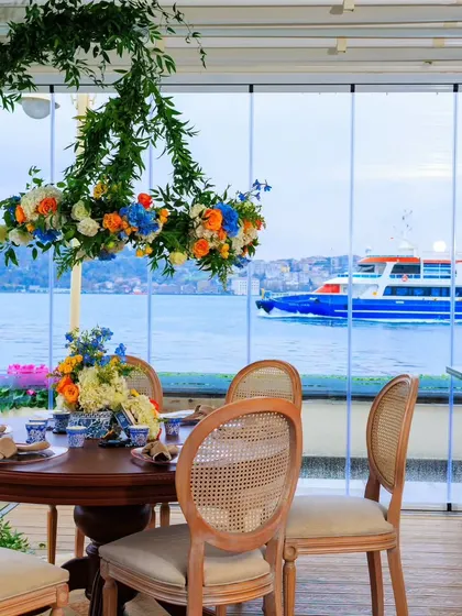 A view from the dining table out to the Bosphorus. We design our layouts to maximize the beauty of the destination, ensuring the view is always part of the decor.