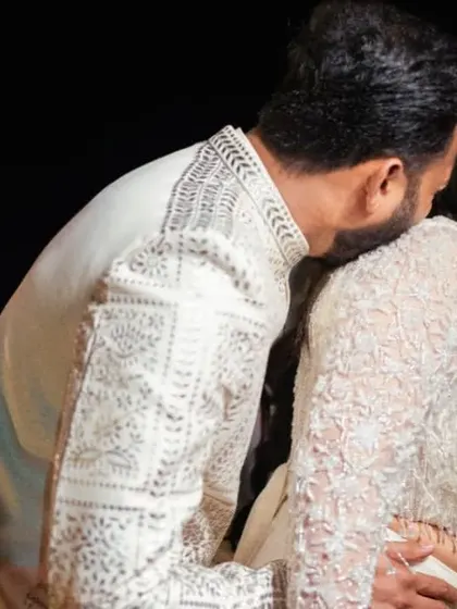 A candid moment of pure laughter and affection between the couple during their Sangeet night.
