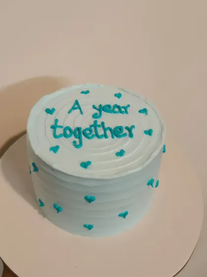 A cute and minimalist anniversary cake celebrating "A year together." This is a great example of my Pinterest-style bento cakes.