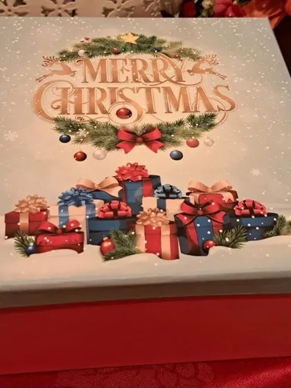 A clear shot of the decorative Christmas box, designed to make your gift feel special from the moment it arrives.