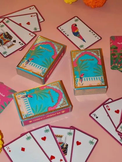 Another look at our custom-designed playing cards, perfect for Diwali game nights. The vibrant colors and traditional motifs make them a festive keepsake.