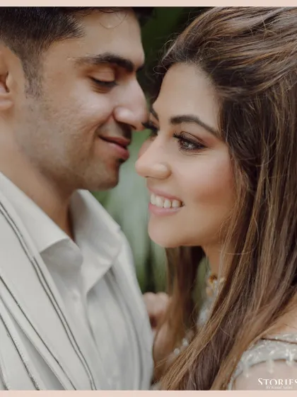 A beautiful and soft close-up portrait of a couple, highlighting their gentle smiles and the love in their eyes.