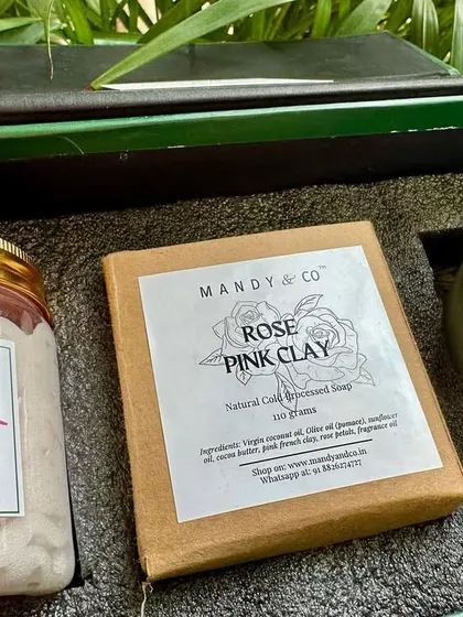 The 'Rose Gift Box', a perfect token of love for the festive season. This set includes a rose whipped soap, a rose pink clay soap bar, and a rose-scented soy candle.