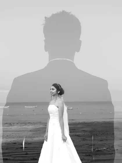 An artistic black and white double exposure, merging the silhouette of the groom with a portrait of the bride against a beach backdrop.