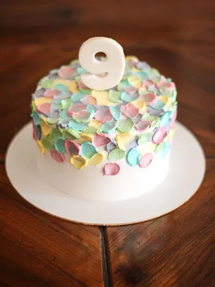 This design reminds me of a shower of confetti and pure joy! It's one of my most requested styles for birthdays because it's so simple, fun, and colorful. I use a palette knife to create these little dabs of pastel-colored frosting.