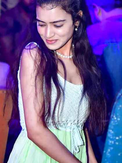 A candid moment on the dance floor. It's the people who make the party, and I'm here to provide the soundtrack for their night.