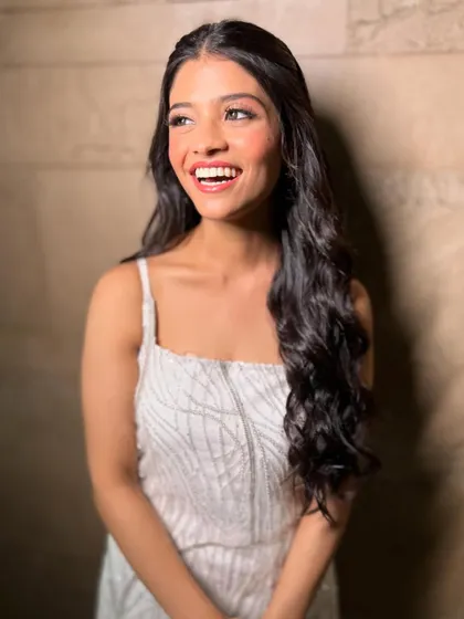Her laugh is infectious! This candid shot shows how comfortable and beautiful she feels.
