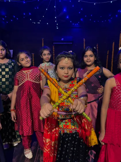 Our kids' batch, dressed in colorful traditional outfits, ready for their Navratri performance.