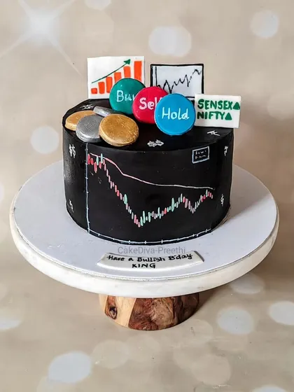 Have a bullish birthday. This cake was designed for a stock trader, featuring a hand-painted stock chart, edible coins, and fondant toppers for "Buy," "Sell," and "Hold."