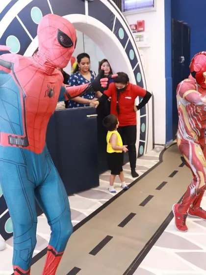 Spiderman and Iron Man make a grand entrance, ready to entertain the kids and make the party unforgettable.