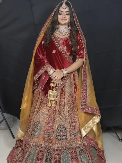 The full silhouette of the Rajwadi lehenga shows its grandeur. Renting such a statement piece means you don't have to worry about storing it afterward.