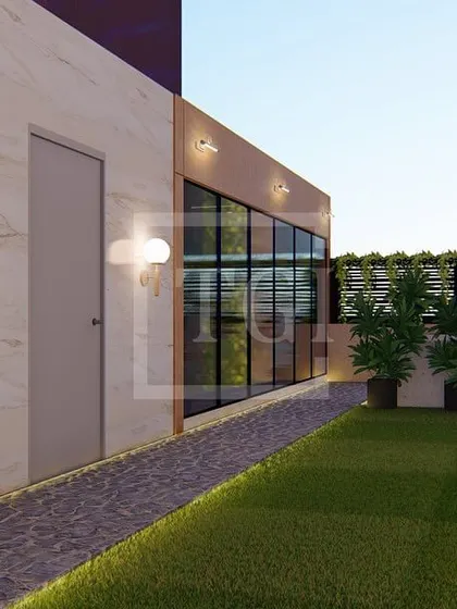 This 3D visualization showcases a clean and modern terrace layout. The design includes a lush green pathway, elegant wall-mounted lights, and a seamless connection to the indoor living area.