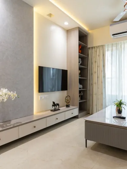 This wide shot shows the full living room from our NESTA range, highlighting the ample storage in the TV unit and the calm, neutral color palette.