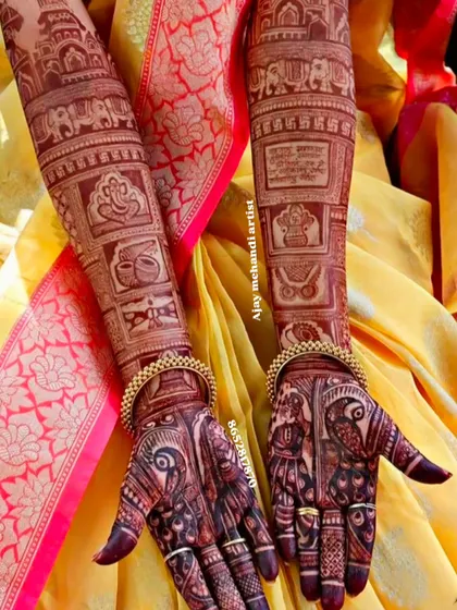 This design features a mix of auspicious symbols, including Ganesha, kalash pots, and elephants, along with a mantra written in Hindi for blessings.