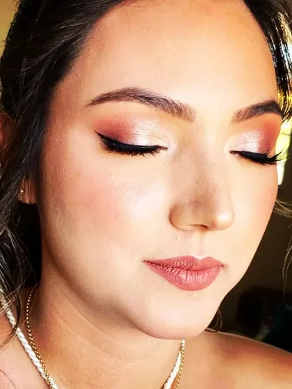 This client wanted a natural look where her skin still looked like skin. I used earthy tones and a light hand to enhance her features for a beautiful, subtle result.