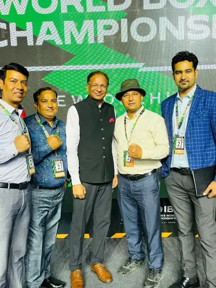 At the World Boxing Championship with other officials and dignitaries. My involvement at the highest levels of boxing ensures my training methods are up to date and effective.