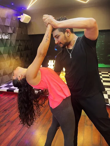 Executing a deep dip in Brazilian Zouk. We teach how to do these advanced moves safely and with confidence.