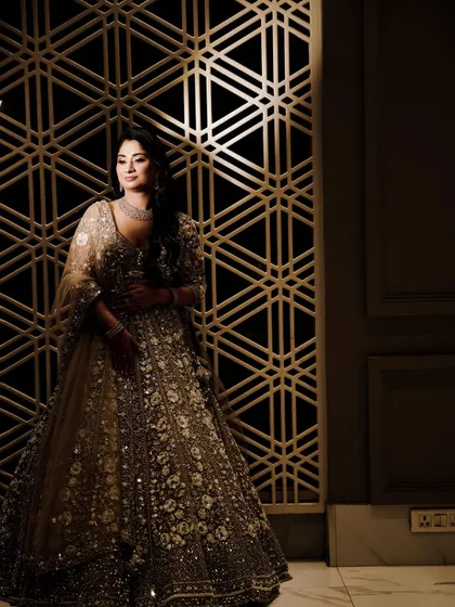 A dramatic solo portrait of the bride-to-be, using shadows and light to create a moody and artistic image.