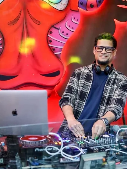Behind the decks at one of my regular Friday night gigs. I love the vibrant and artistic backdrop at this venue.