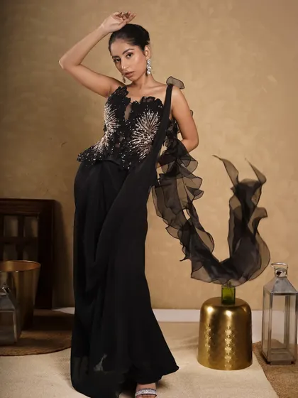 A full-length shot that captures the dramatic movement of the ruffled dupatta. This image tells a story of glamour and movement, perfect for a social media campaign.