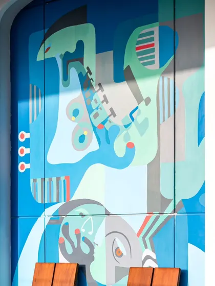 The full panel of the 'Embrace' mural, showing the complete abstract composition that represents the feeling of a warm, accepting hug.