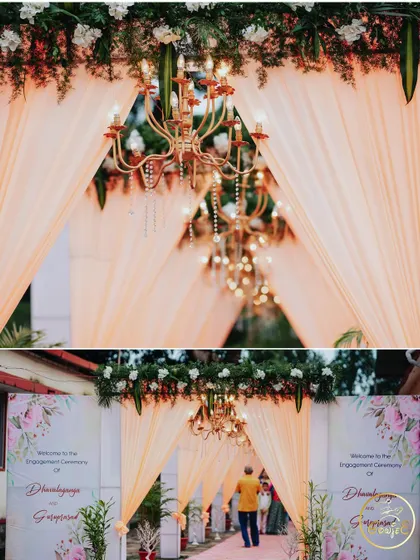 A beautiful peach-themed entrance for an engagement ceremony, with elegant drapes and chandeliers.