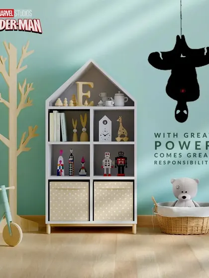 "With great power comes great responsibility." A minimalist Spider-Man silhouette hangs upside down in this tastefully designed kid's room.