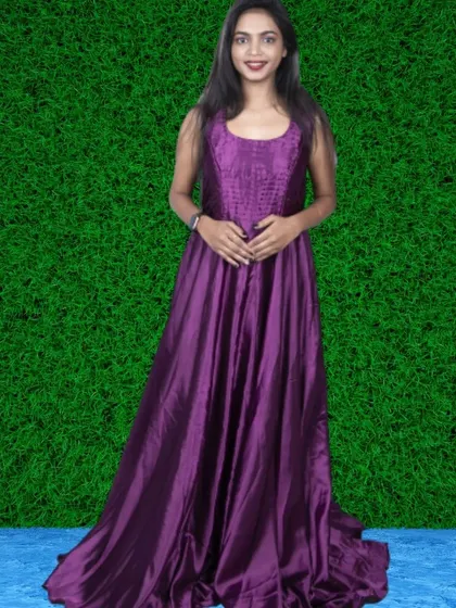 A deep purple satin gown with a textured bodice. The simple A-line cut is classic and flattering for all body types.