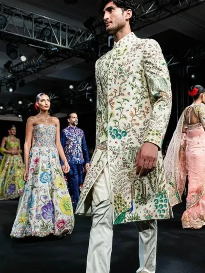 The full runway look of the garden-embroidered sherwani, showing its magnificent presence.