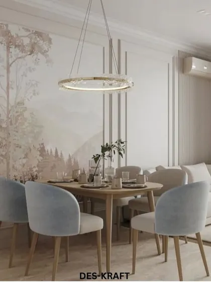 Another view of the dining area, where a crystal-ring chandelier adds a touch of glamour to the simple, modern furniture.