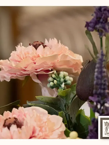 Another close-up, this time showing the combination of soft pink carnations and purple lavender in a maintenance-free bouquet.