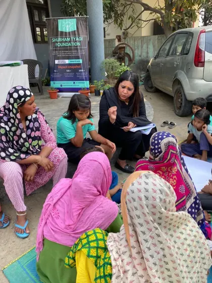 An intimate legal awareness session with women and children from an underprivileged community, in collaboration with the Shubham Tyagi Foundation. Sitting with them on the ground helps break down barriers and fosters an environment of trust.