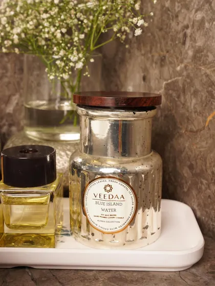 Kickstart your Monday with the refreshing scent of Blue Island Water. This candle, housed in a beautiful mercury glass jar, is perfect for setting a positive and energized tone for the week.