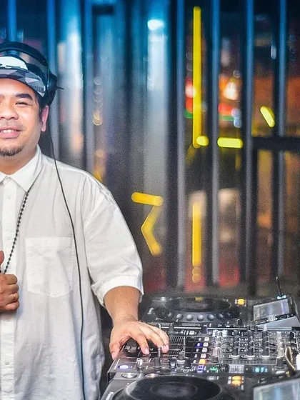 All set and ready to launch into the weekend. A thumbs-up from the DJ booth means we're about to have a great night.