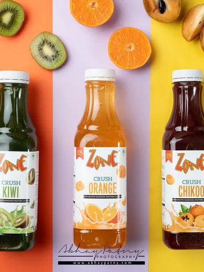 Using bold, color-blocked backgrounds is a great way to showcase a range of product flavors. This technique creates a modern and energetic look that is perfect for brands targeting a younger audience.