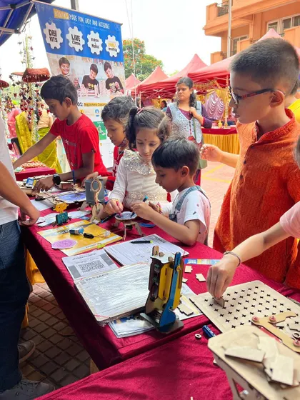 Absolutely splendid! These pictures capture the fun and discovery at one of our event stalls. Kids of all ages get to stop by, tinker with our kits, and get a taste of what it's like to be a maker.