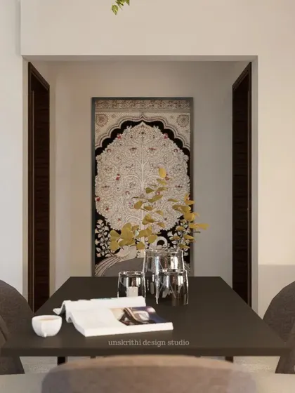 A simple, focused view from the dining table. The artwork at the end of the corridor acts as a focal point, drawing the eye and adding a layer of cultural depth. Sometimes, the best designs are the ones that give you a clear and beautiful perspective.