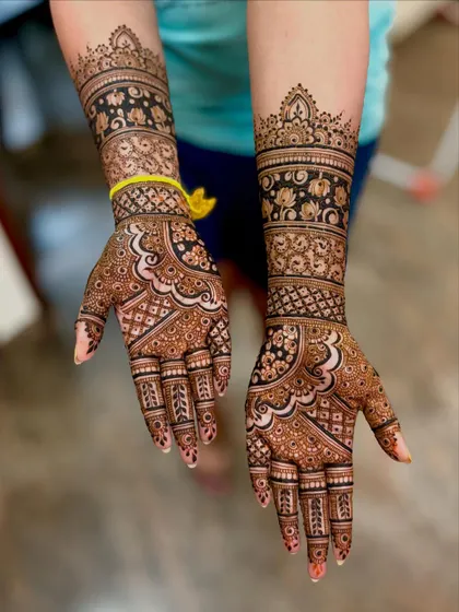 An angled view of the floral band design, showing how the patterns wrap around the arm.