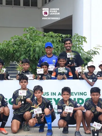 This team showcases their commitment to the #GoalsBeyondGoals initiative.