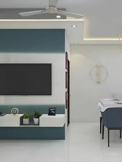 This design shows how the TV unit can be integrated into a larger living and dining space. The teal and white color scheme connects the two areas seamlessly.