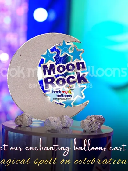 Let our enchanting balloons cast a magical spell. This "Moon Rock" centerpiece was a custom detail for a space-themed party, showing how we can create unique elements to fit your vision.