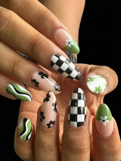 I love a challenge, and this mixed-pattern set was so much fun to create. It combines trendy checkerboard, delicate florals, and bold swirls on almond-shaped gel extensions.