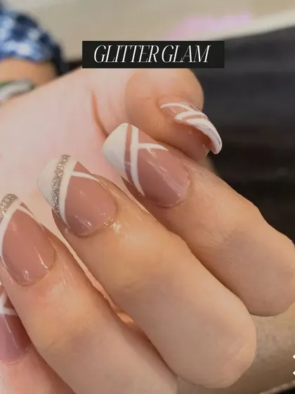 A closer view of the "Glitter Glam" nails, showing the precise line work and tasteful use of glitter.