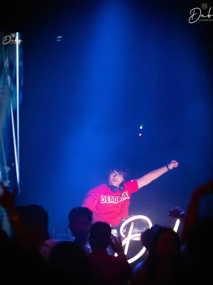A shot from my electrifying performance at Dabo Club. The blue lights and high energy made for an unforgettable night.