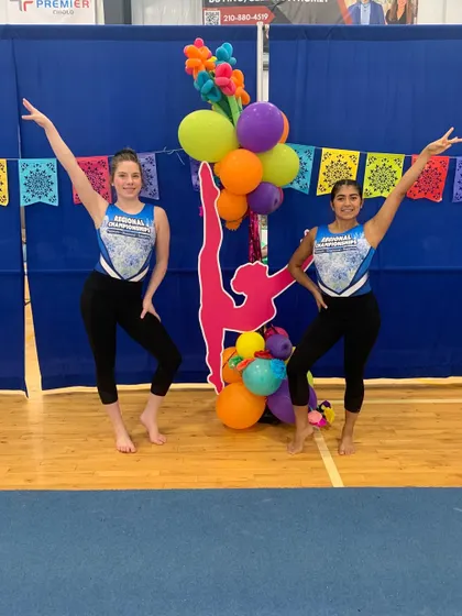 Our gymnasts striking a pose after competing at the regional championships. We teach our athletes to perform with confidence and grace.