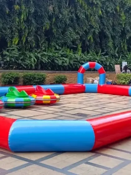 The full setup of the inflatable bumper car attraction, ready for a day of fun at a kids' birthday party.