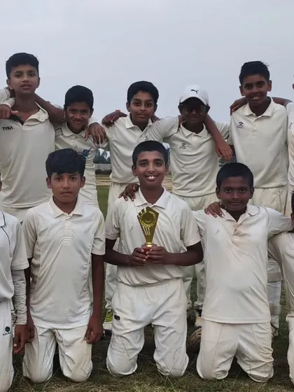 Our U-12 team celebrating with their trophy after a solid victory against STCC in the New Year Cup.