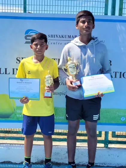 Ishaan Yadlapalli with his trophy from the AITA Nationals U14 Super Series. This image captures the successful outcome of countless hours of practice and strategic coaching.