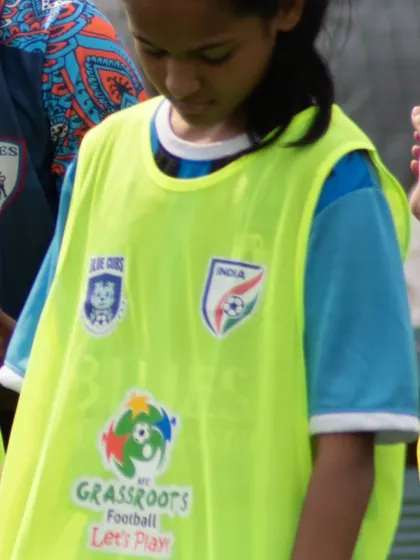A close-up of the logos on our training bibs, including AIFF, AFC Grassroots Football, and Blue Cubs, representing our commitment to grassroots development.