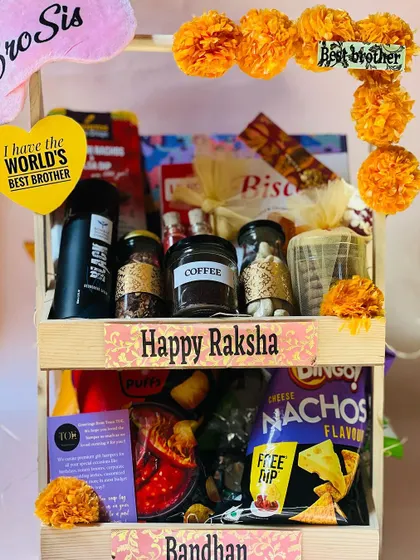 This large Rakhi hamper is a feast for the eyes, packed with a variety of treats for a special brother.